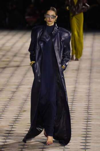 Long dark leather trench coat at Saint Laurent Fashion week