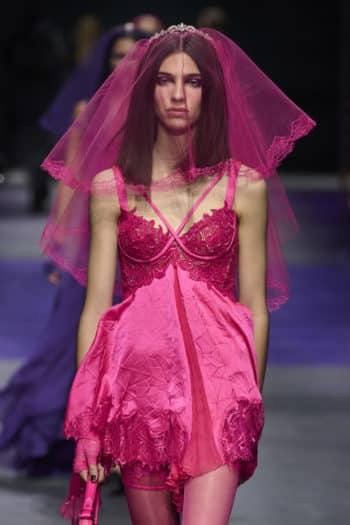 Short bright pink dress with veil at Versace SS23